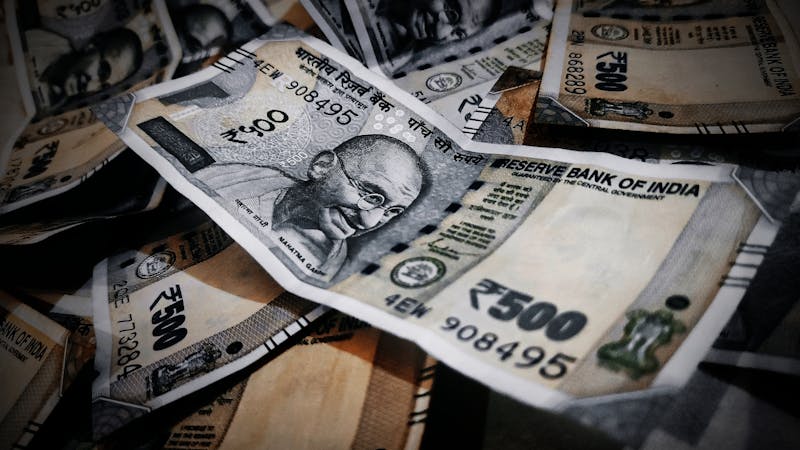 Stack of Indian 500 rupee notes, representing the expenses you need to track to take control of your finances