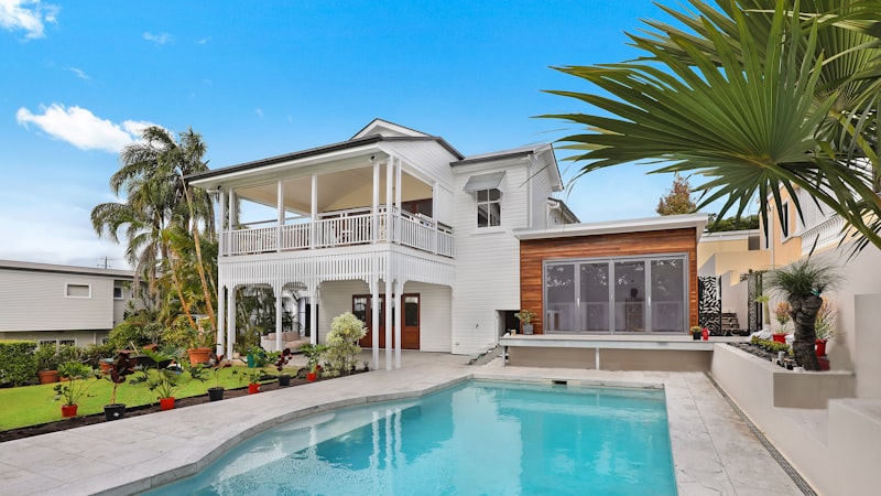 Modern home exterior representing the property investment extra mortgage repayments help protect